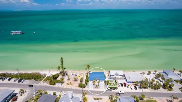 a view of yard and ocean view