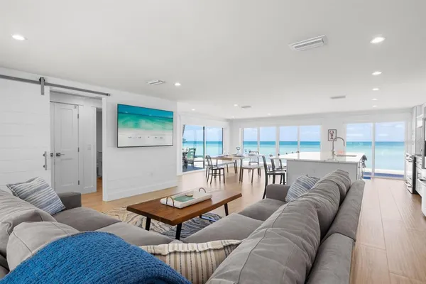 a living room with furniture and a table