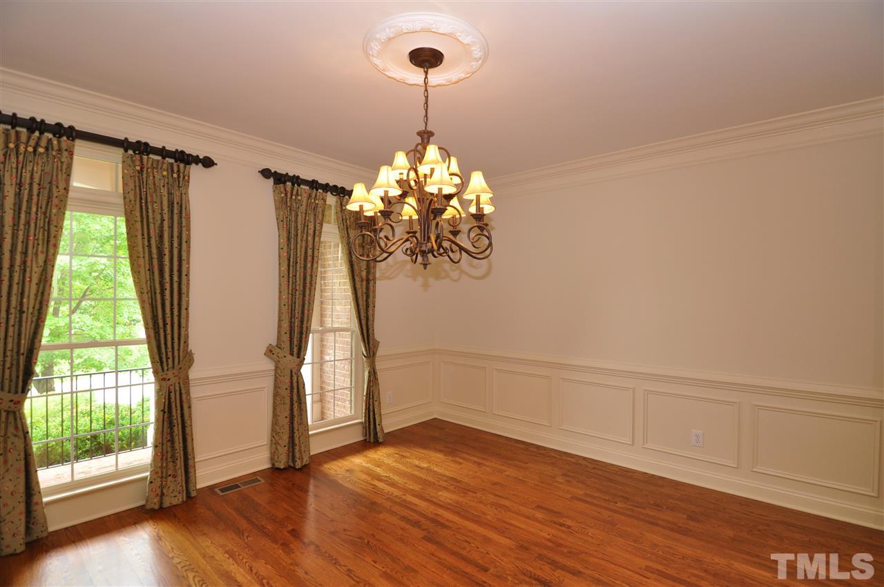 2005 Lowery Farm Lane Raleigh, NC 27614 - Photo 22 of 25 a view of empty room with wooden floor and fan
