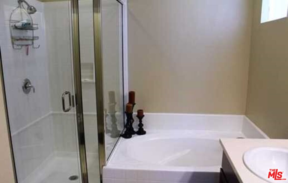 20329 Paseo Los Arcos Porter Ranch, CA 91326 - Photo 14 of 22 a bathroom with a tub and a sink