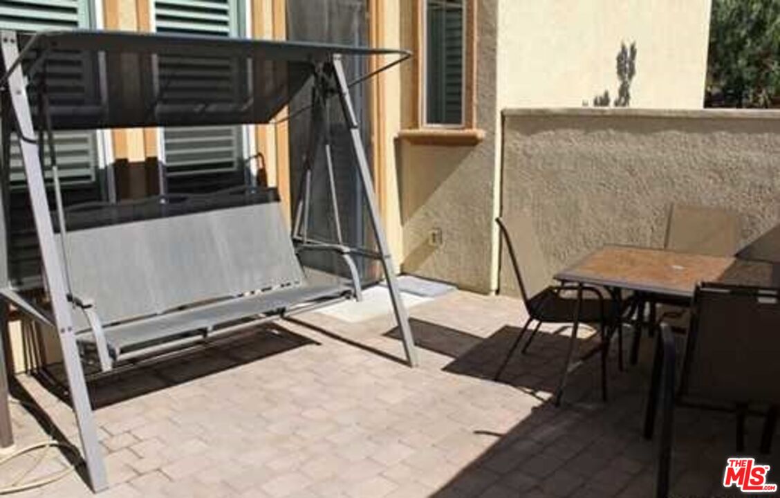 20329 Paseo Los Arcos Porter Ranch, CA 91326 - Photo 15 of 22 a view of balcony with wooden floor and iron fence