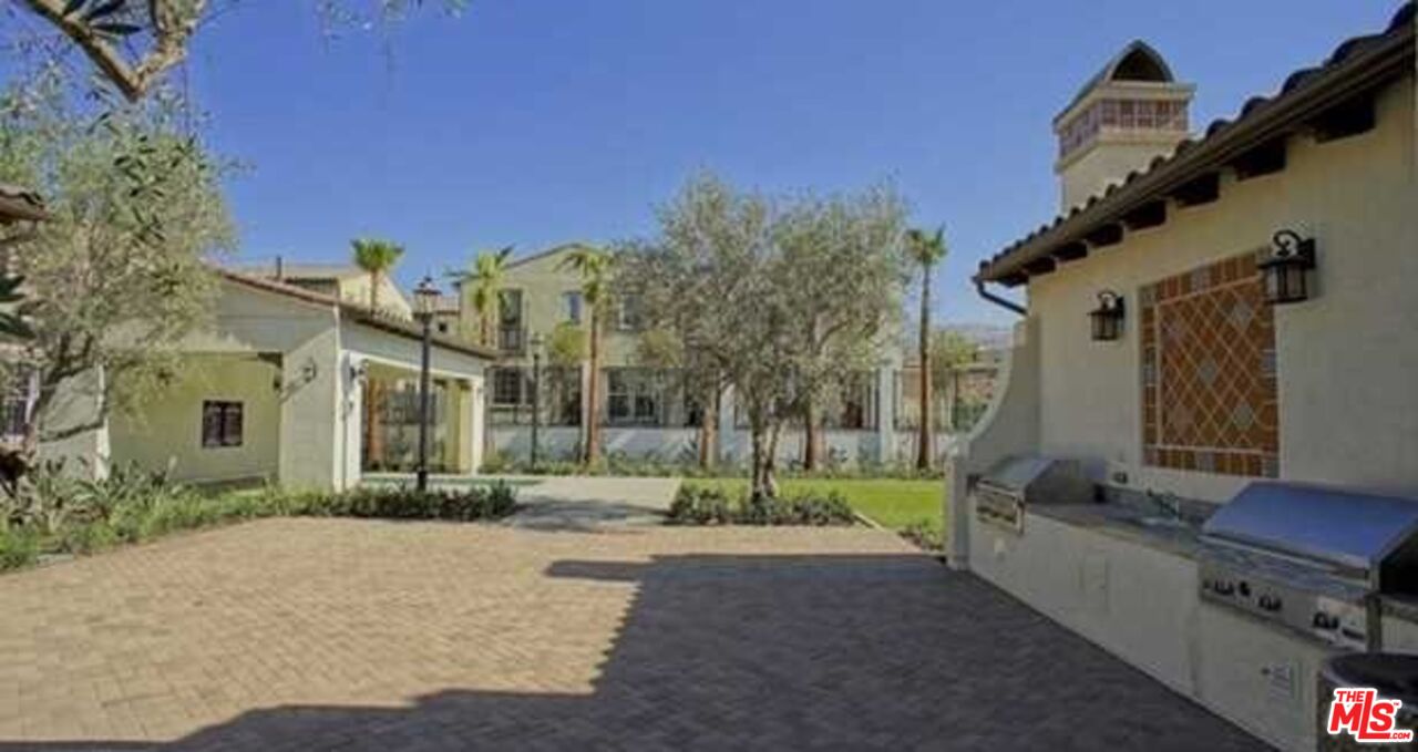 20329 Paseo Los Arcos Porter Ranch, CA 91326 - Photo 19 of 22 a view of a house with a street