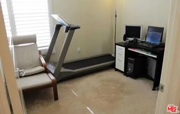 a view of room with a flat screen tv