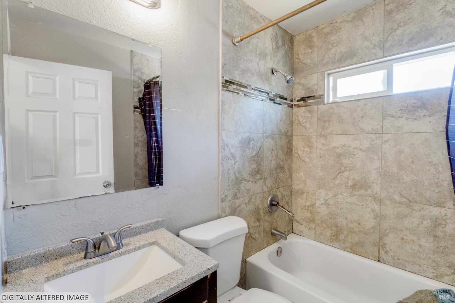 1722 Indiana Street Fairfield, CA 94533 - Photo 6 of 18 a bathroom with a sink and a mirror