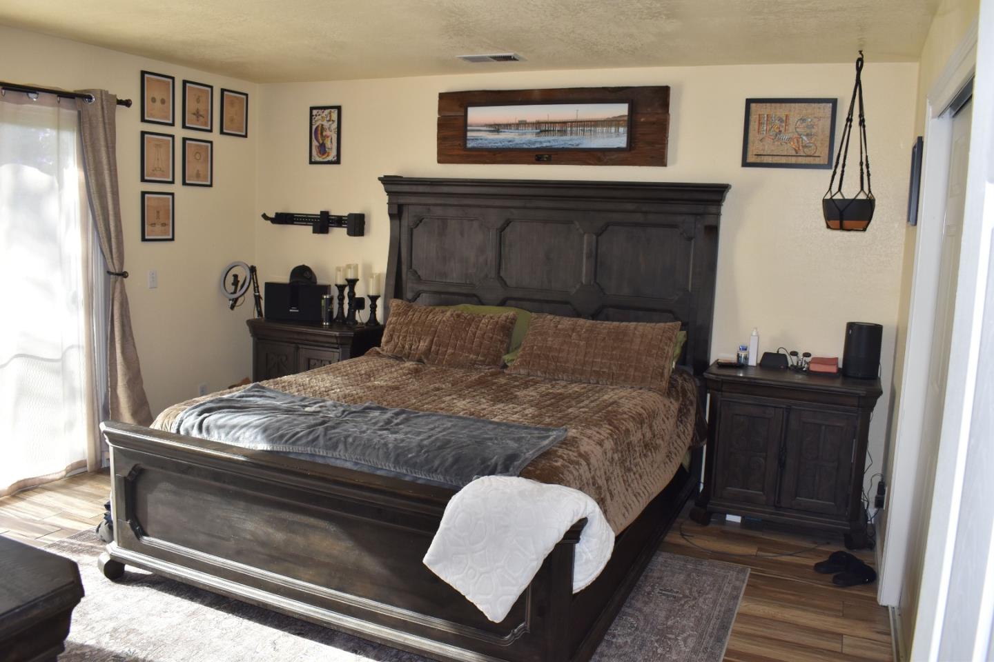 359 North 3rd Street Grover Beach, CA 93433 - Photo 16 of 23 a bedroom with a bed and dresser