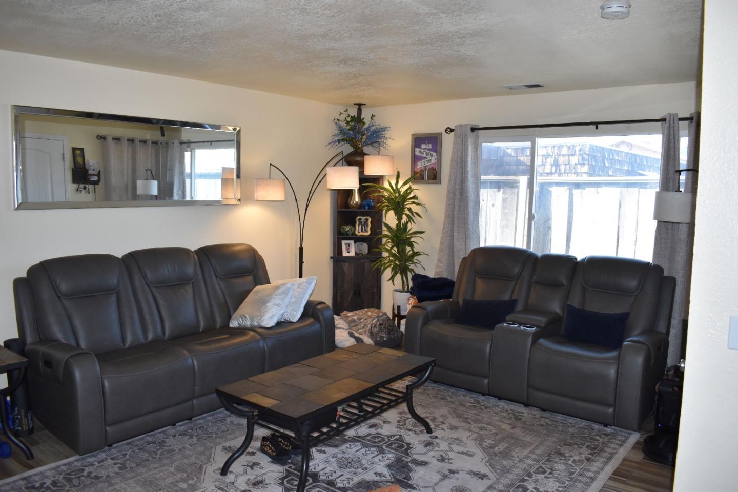 359 North 3rd Street Grover Beach, CA 93433 - Photo 17 of 23 a living room with furniture and a window