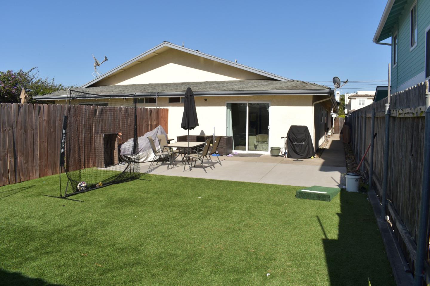 359 North 3rd Street Grover Beach, CA 93433 - Photo 19 of 23 a view of a house with backyard porch and sitting area