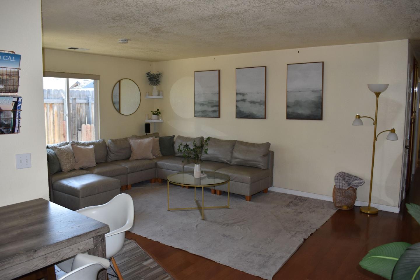 359 North 3rd Street Grover Beach, CA 93433 - Photo 22 of 23 a living room with furniture and a wooden floor
