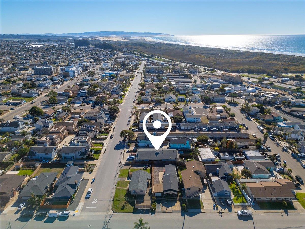 359 North 3rd Street Grover Beach, CA 93433 - Photo 3 of 10 an aerial view of a city with lots of residential buildings