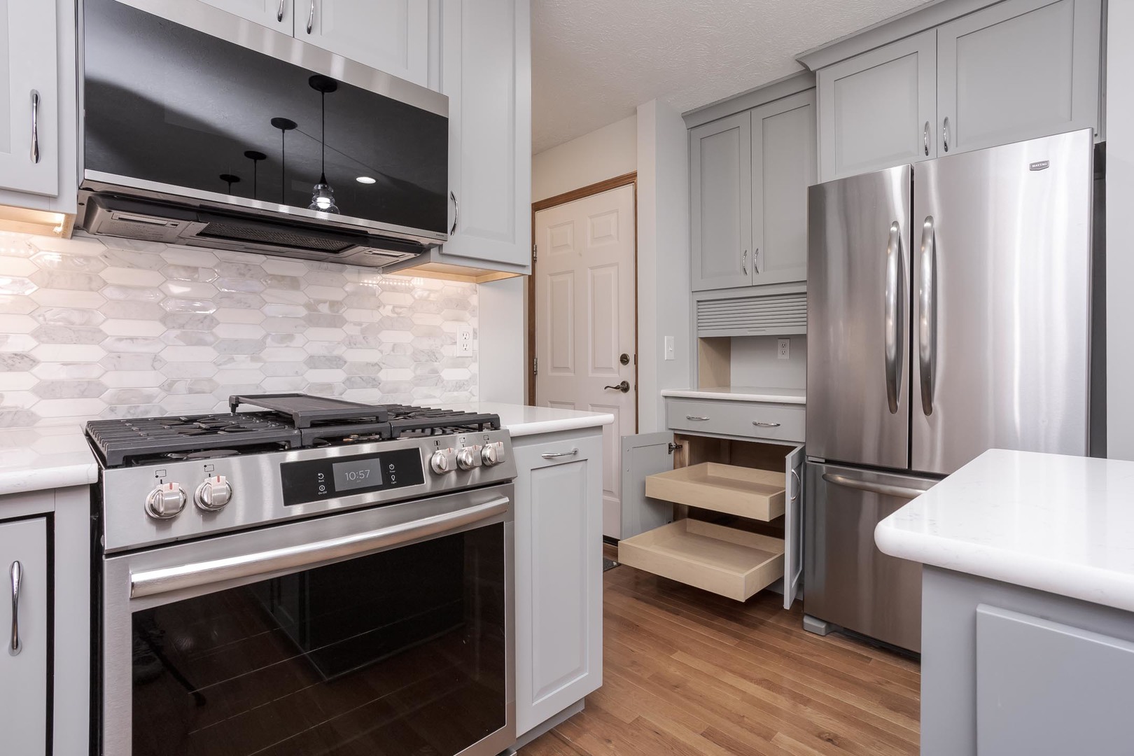 814 Landau Lane Normal, IL 61761 - Photo 24 of 58 a kitchen with a stove and a microwave