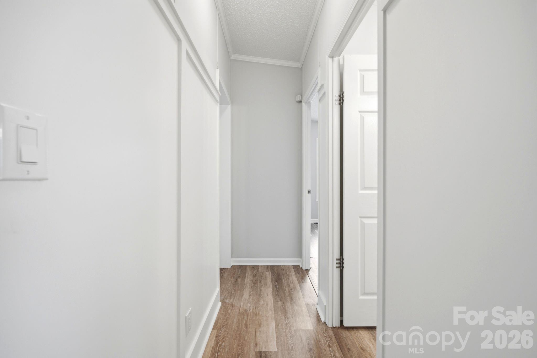 2368 Beth Haven Church Road Denver, NC 28037 - Photo 20 of 42 a view of a hallway with wooden floor