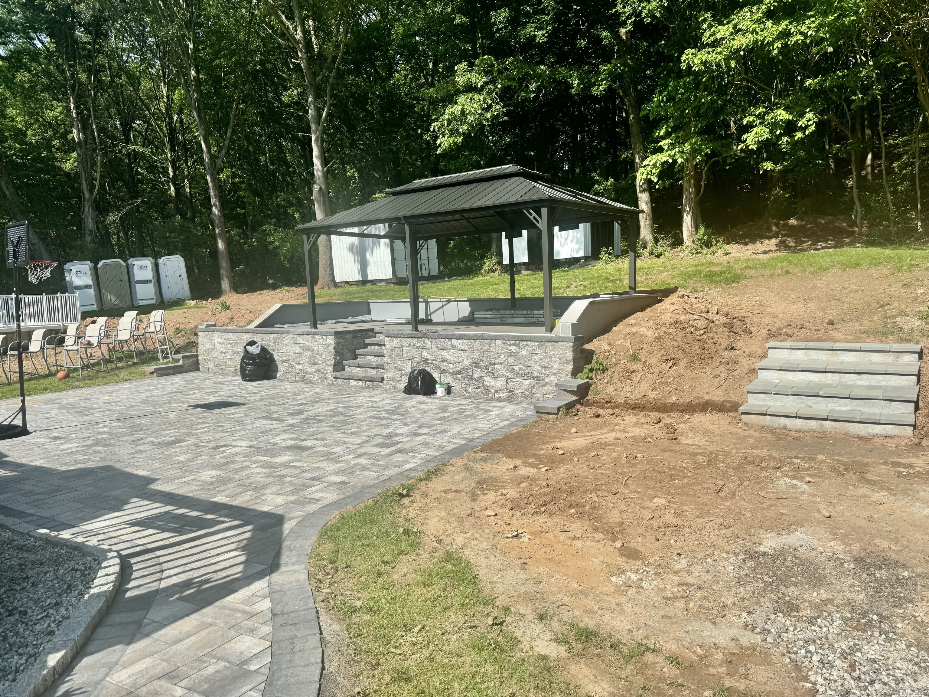 116 Dunbar Lane, Unit 2 Hamden, CT 06514 - Photo 4 of 22 a view of backyard with swimming pool and outdoor seating