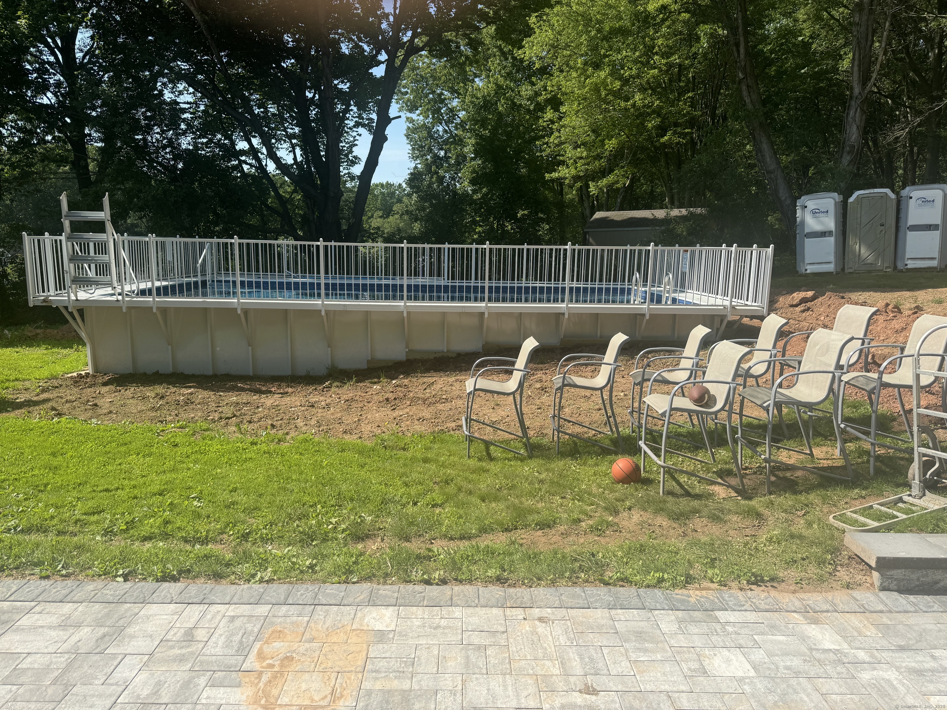 116 Dunbar Lane, Unit 2 Hamden, CT 06514 - Photo 5 of 22 a view of a swimming pool with a patio