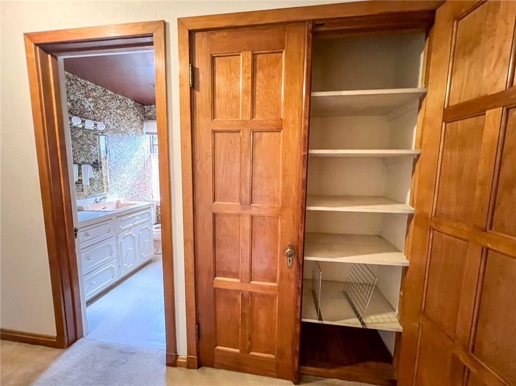 605 Center Street Emlenton, PA 16373 - Photo 36 of 47 a view of walk in closet with empty racks