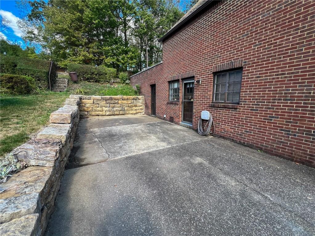 605 Center Street Emlenton, PA 16373 - Photo 40 of 47 a view of a house with a yard and garage