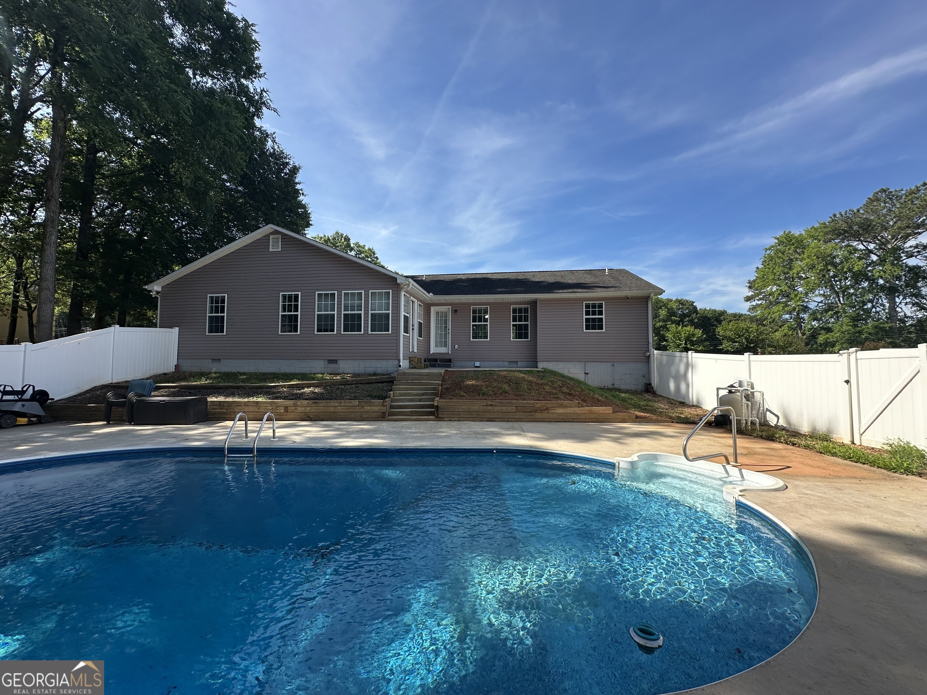 384 Sam Brown Boulevard Commerce, GA 30529 - Photo 21 of 25 a front view of a house with a yard