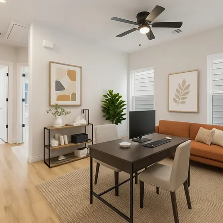 a workspace with furniture and a potted plant