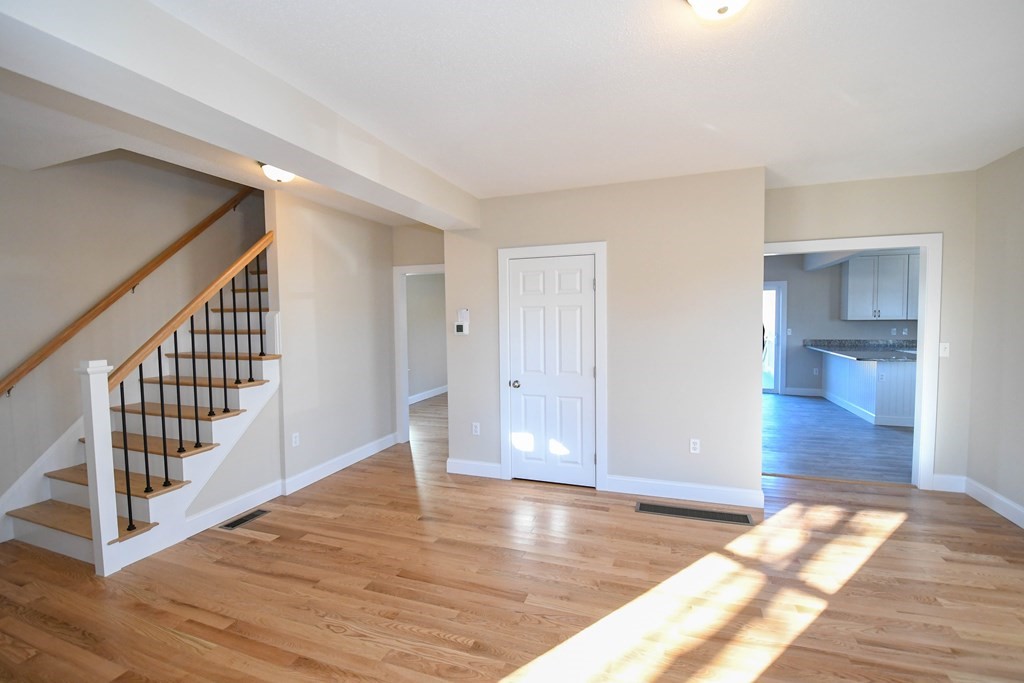 286 Wheeler Road Dracut, MA 01826 - Photo 13 of 32 a view of entryway with wooden floor