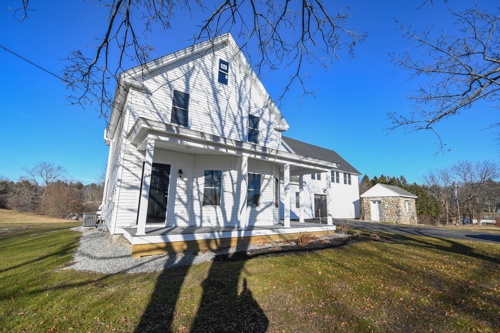 286 Wheeler Road Dracut, MA 01826 - Photo 3 of 32 a view of a house with pool and sitting area