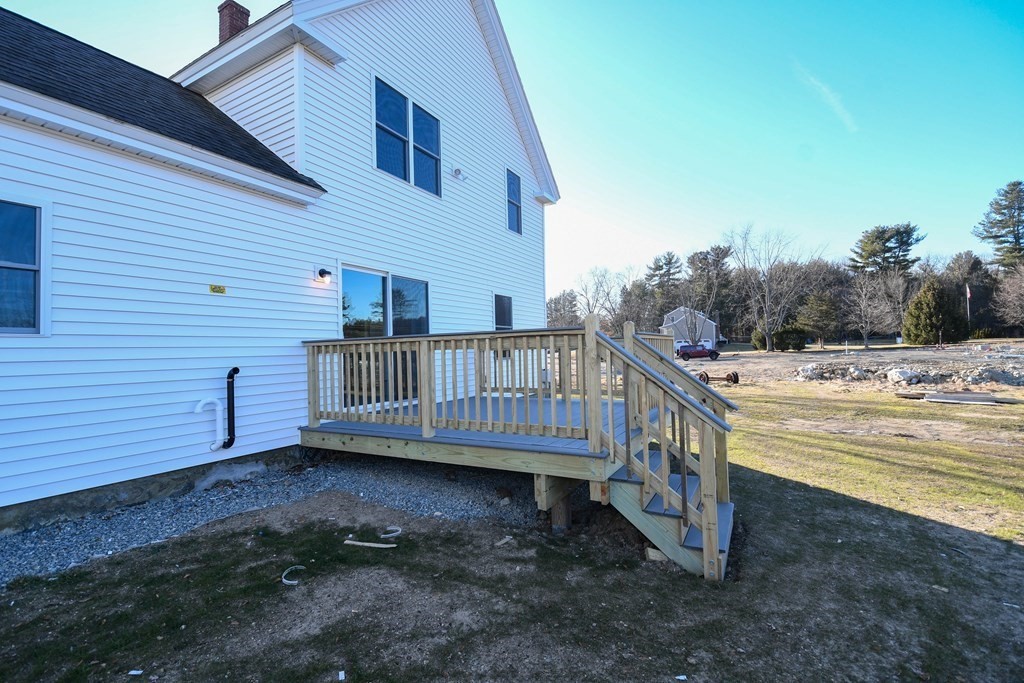 286 Wheeler Road Dracut, MA 01826 - Photo 6 of 32 a view of a house with a yard from a balcony