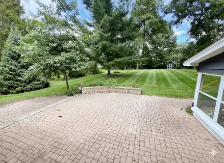 a view of backyard with green space