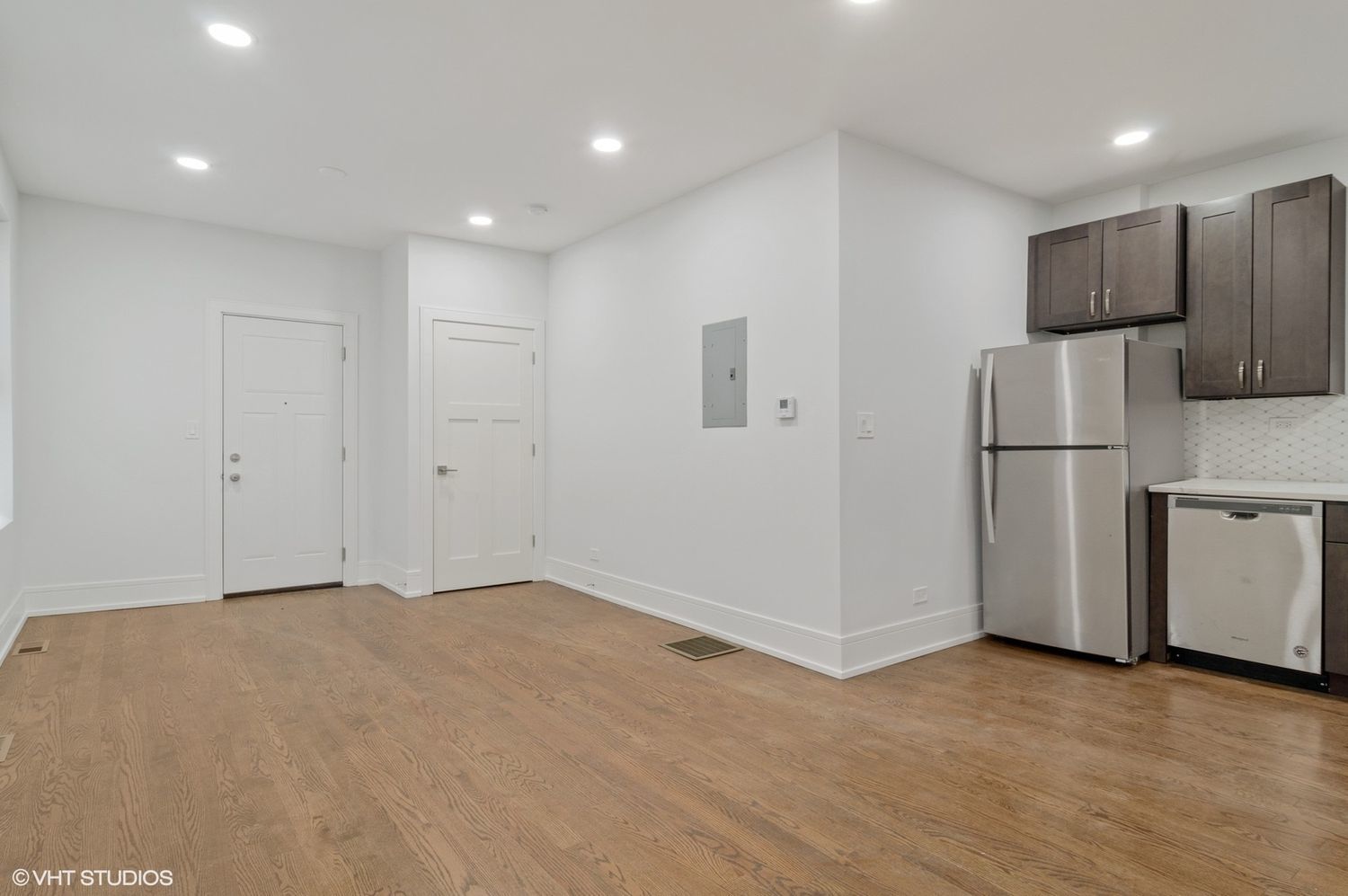 1719 West 18th Street, Unit 2R Chicago, IL 60608 - Photo 4 of 8 a view of an empty room with a refrigerator