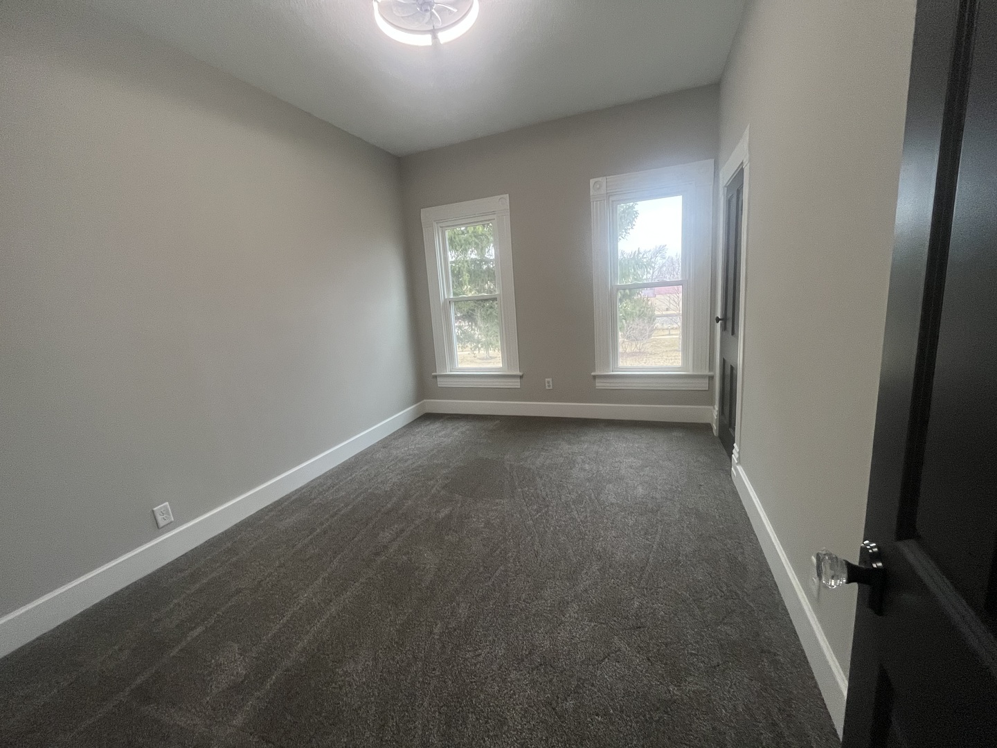 125 South Main Street Clifton, IL 60927 - Photo 17 of 30 an empty room with windows