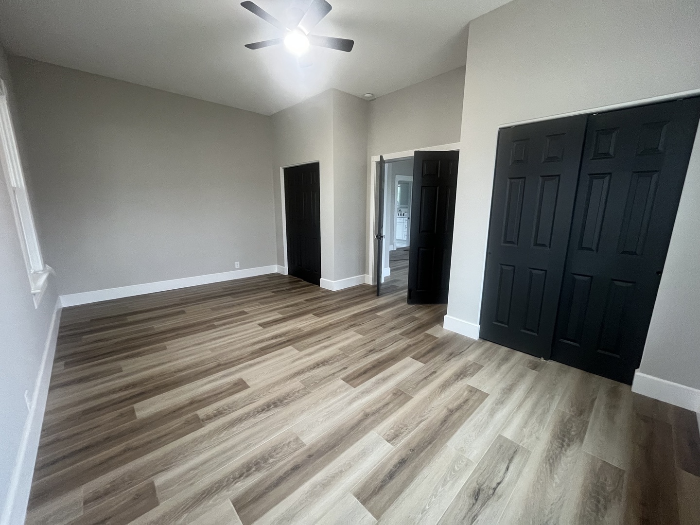 125 South Main Street Clifton, IL 60927 - Photo 20 of 30 a view of an empty room with wooden floor