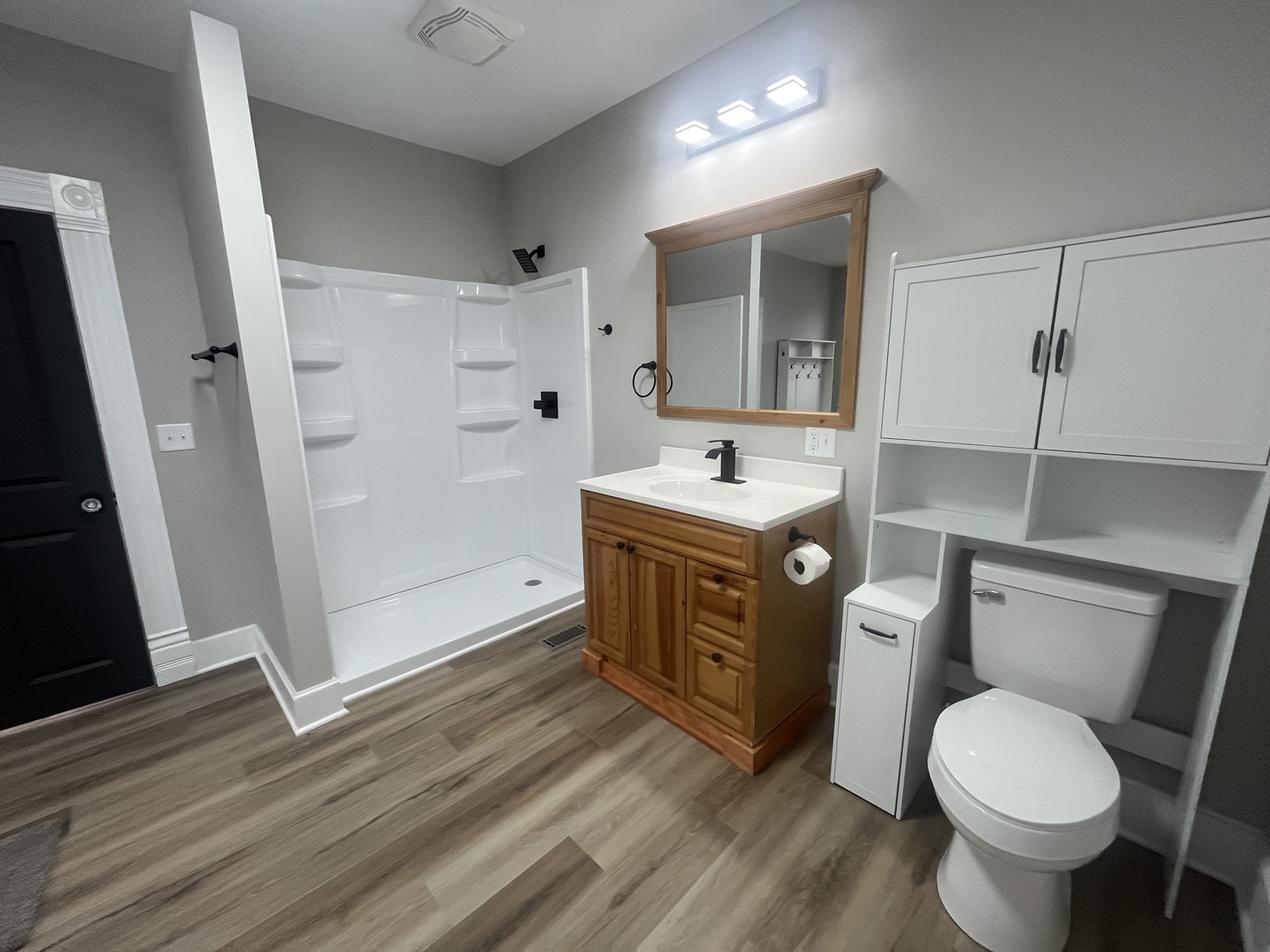 125 South Main Street Clifton, IL 60927 - Photo 24 of 30 a bathroom with a sink toilet and shower