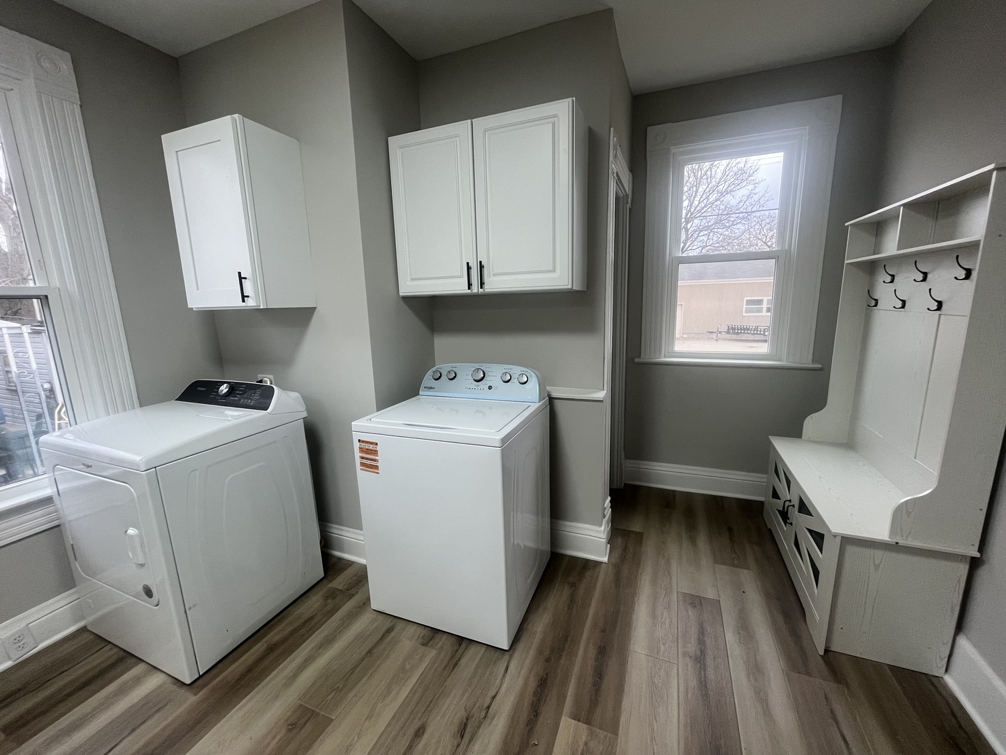125 South Main Street Clifton, IL 60927 - Photo 25 of 30 a utility room with cabinets dryer and washer