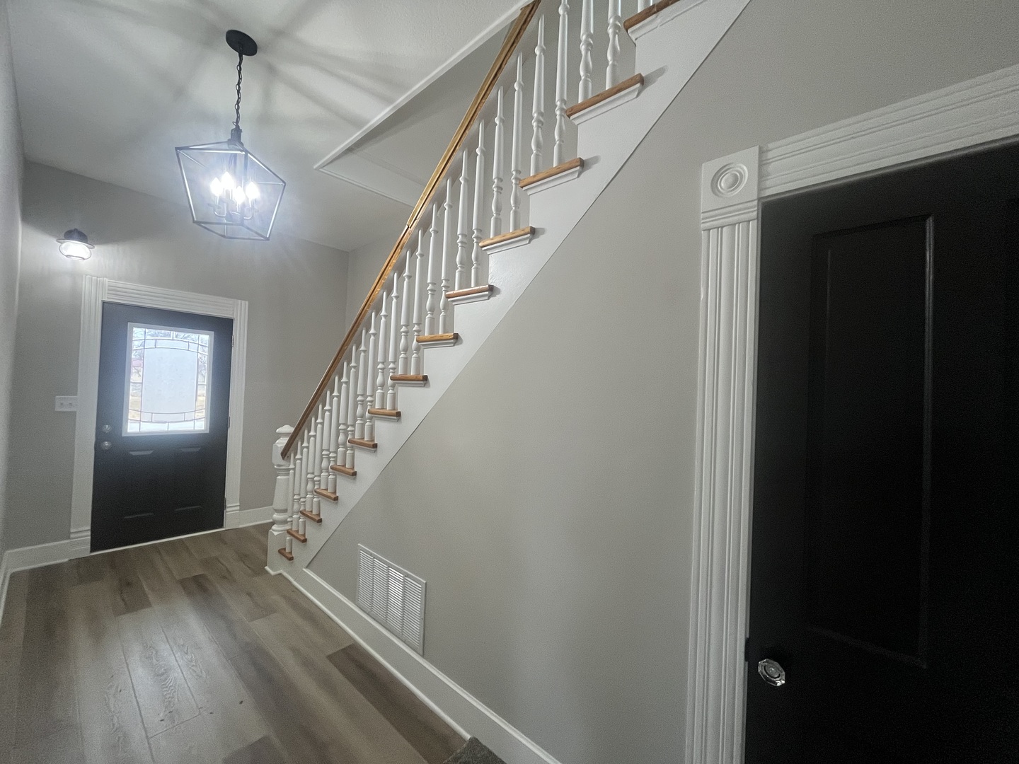 125 South Main Street Clifton, IL 60927 - Photo 5 of 30 a view of entryway and hall with wooden floor
