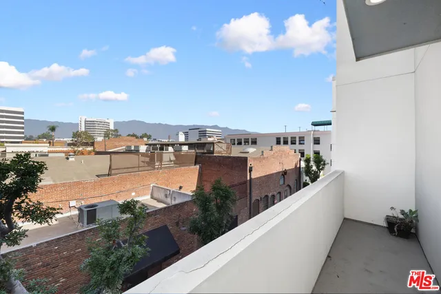 a big room with painting on the wall