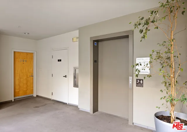 a picture of a brick building with a large window