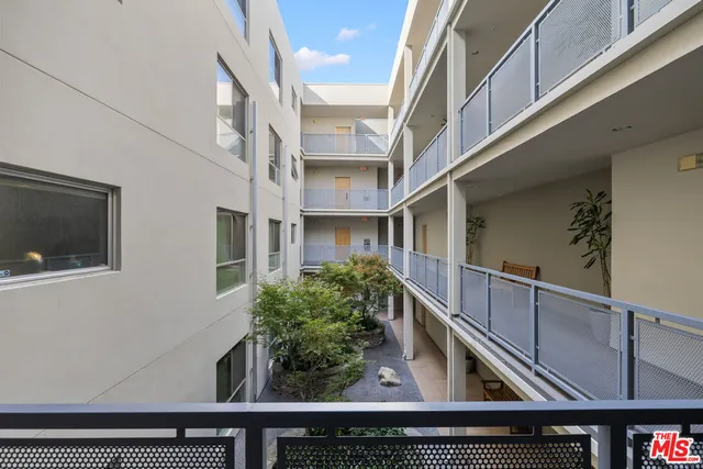 an outdoor living and dining room view
