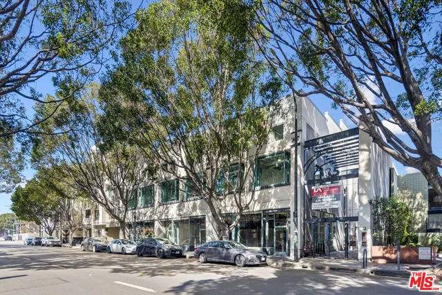 a city street lined with tall buildings