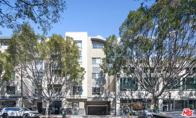 a front view of a building with street view