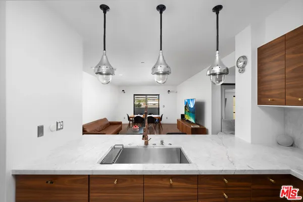 a kitchen with sink and window