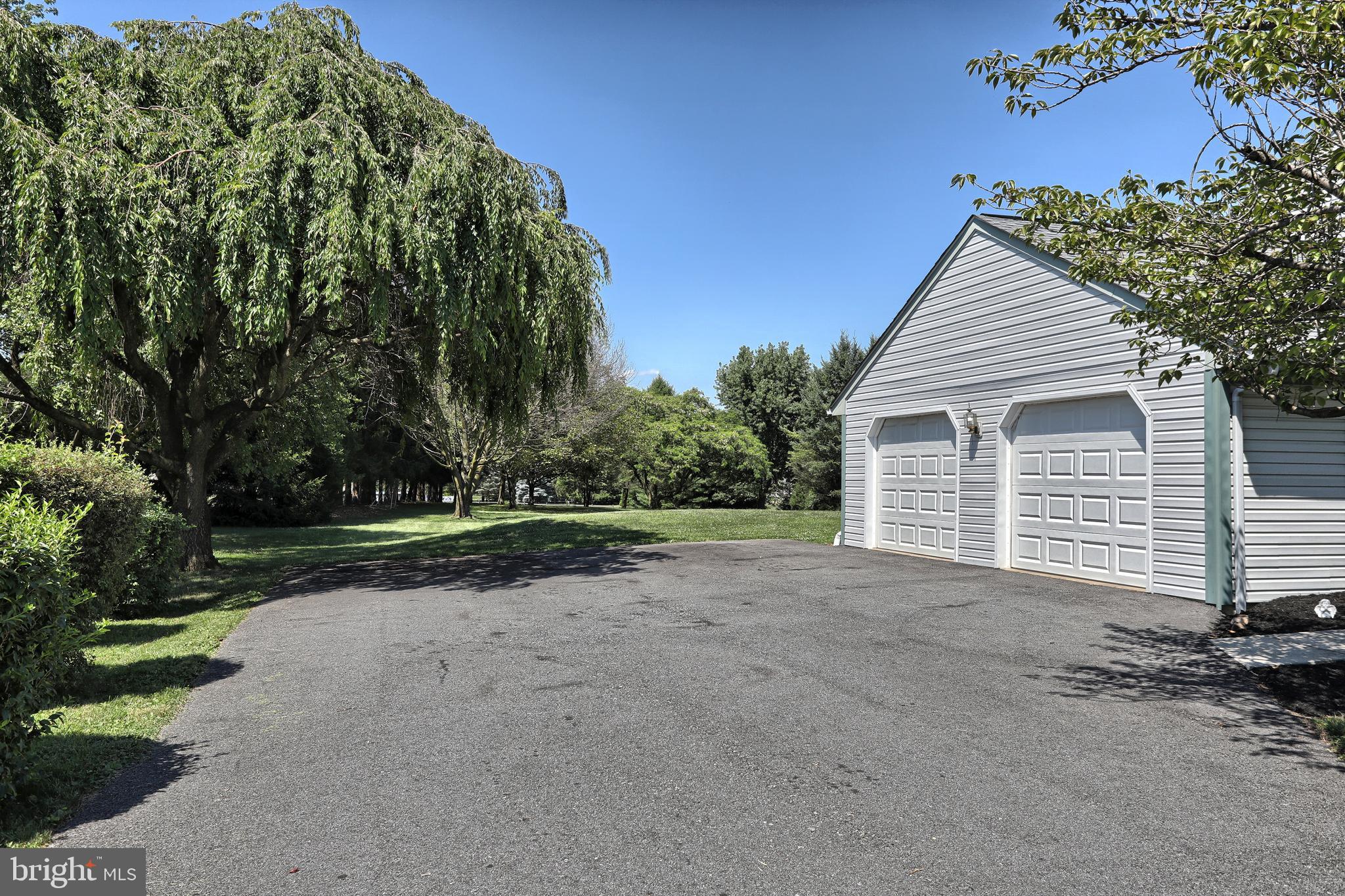 403 East Rosebud Road Myerstown, PA 17067 - Photo 25 of 33 Plenty of parking. Garage is 27'x24'.