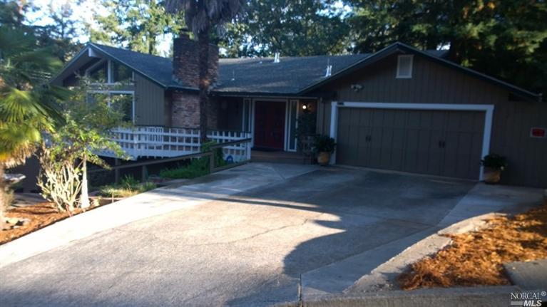 1385 Quail Court Santa Rosa, CA 95404 - Photo 1 of 1 a front view of a house with a yard