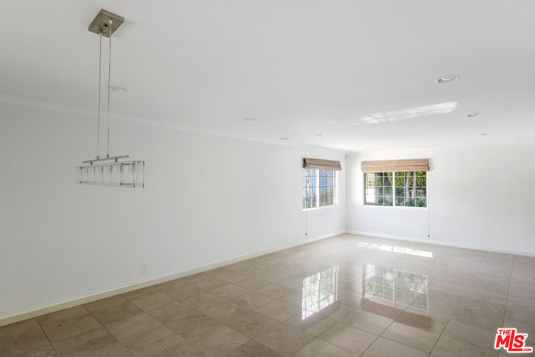 16636 Calneva Drive Encino, CA 91436 - Photo 5 of 19 a view of an empty room with a window