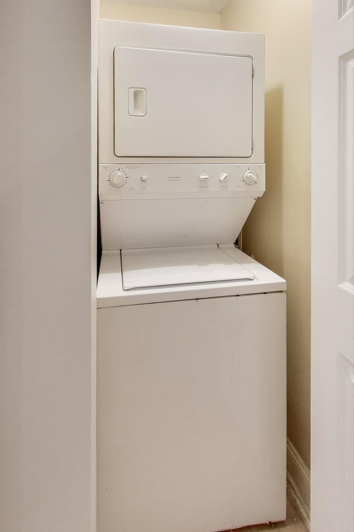 1920 North Springfield Avenue, Unit 1S Chicago, IL 60647 - Photo 20 of 36 a close up of a washer