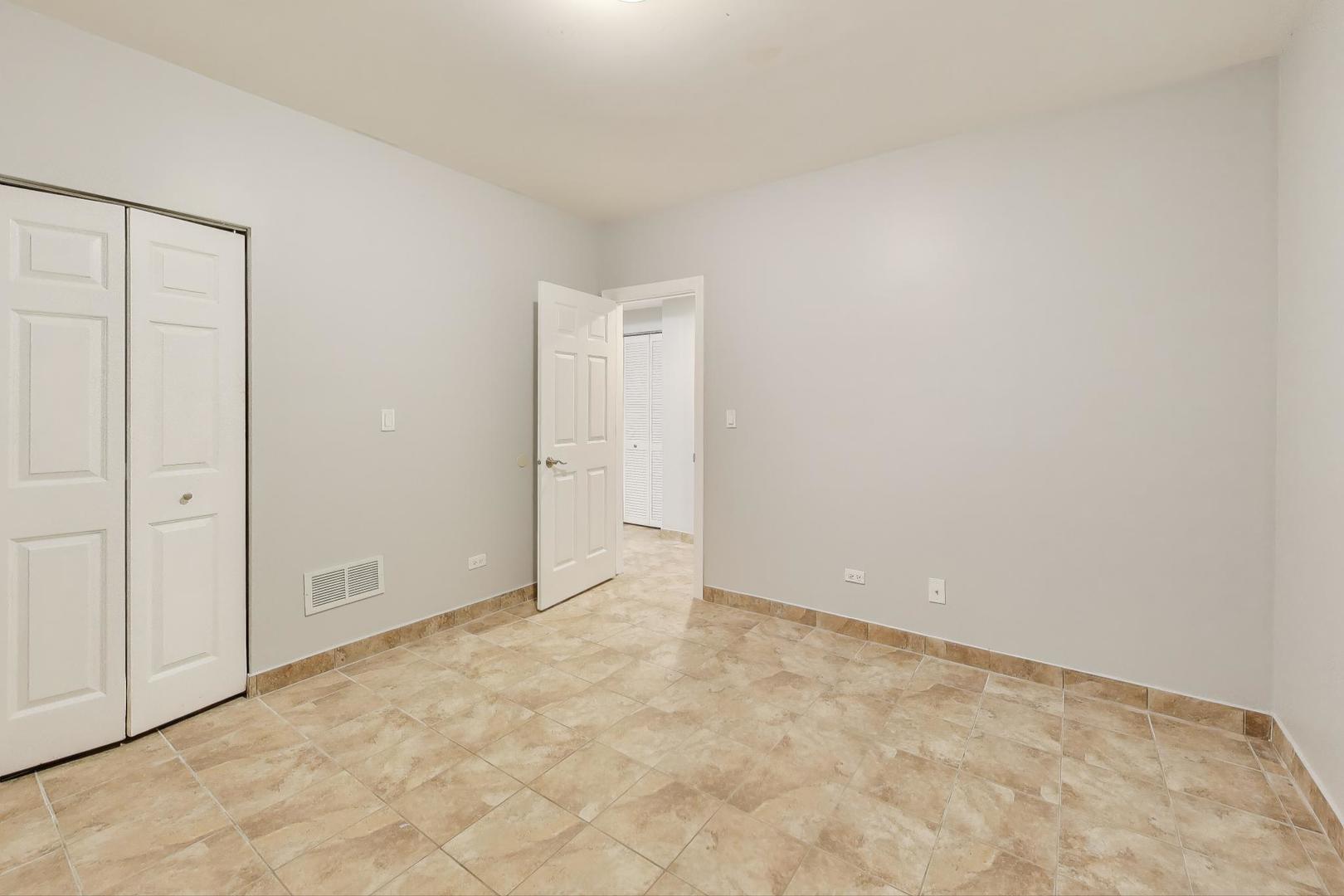 1920 North Springfield Avenue, Unit 1S Chicago, IL 60647 - Photo 29 of 36 a view of an empty room