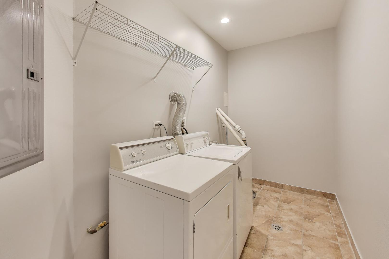 1920 North Springfield Avenue, Unit 1S Chicago, IL 60647 - Photo 34 of 36 a bathroom with a sink and vanity