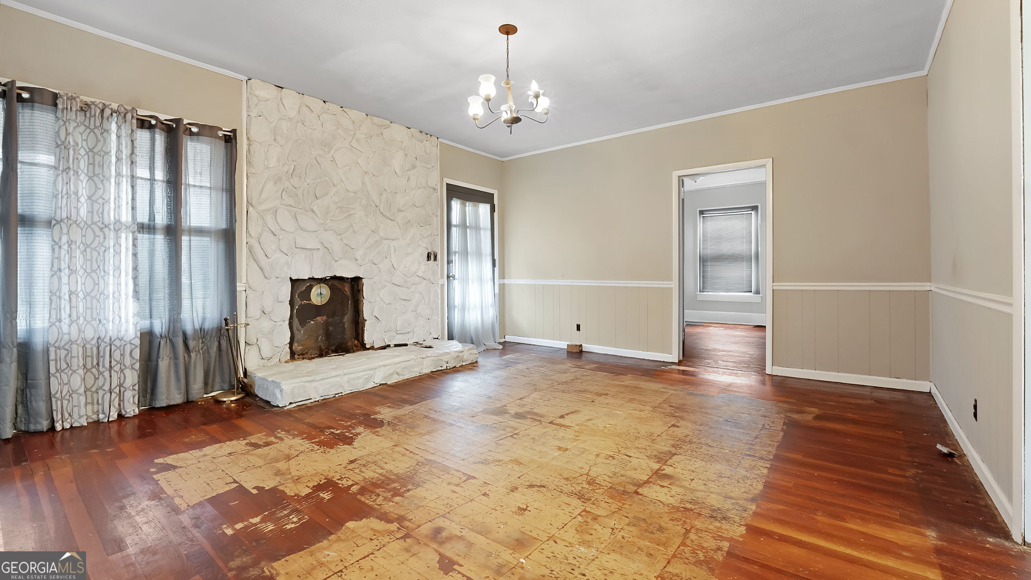 110 Bevis Circle Bowdon, GA 30108 - Photo 13 of 26 a view of livingroom with hardwood floor and a fireplace