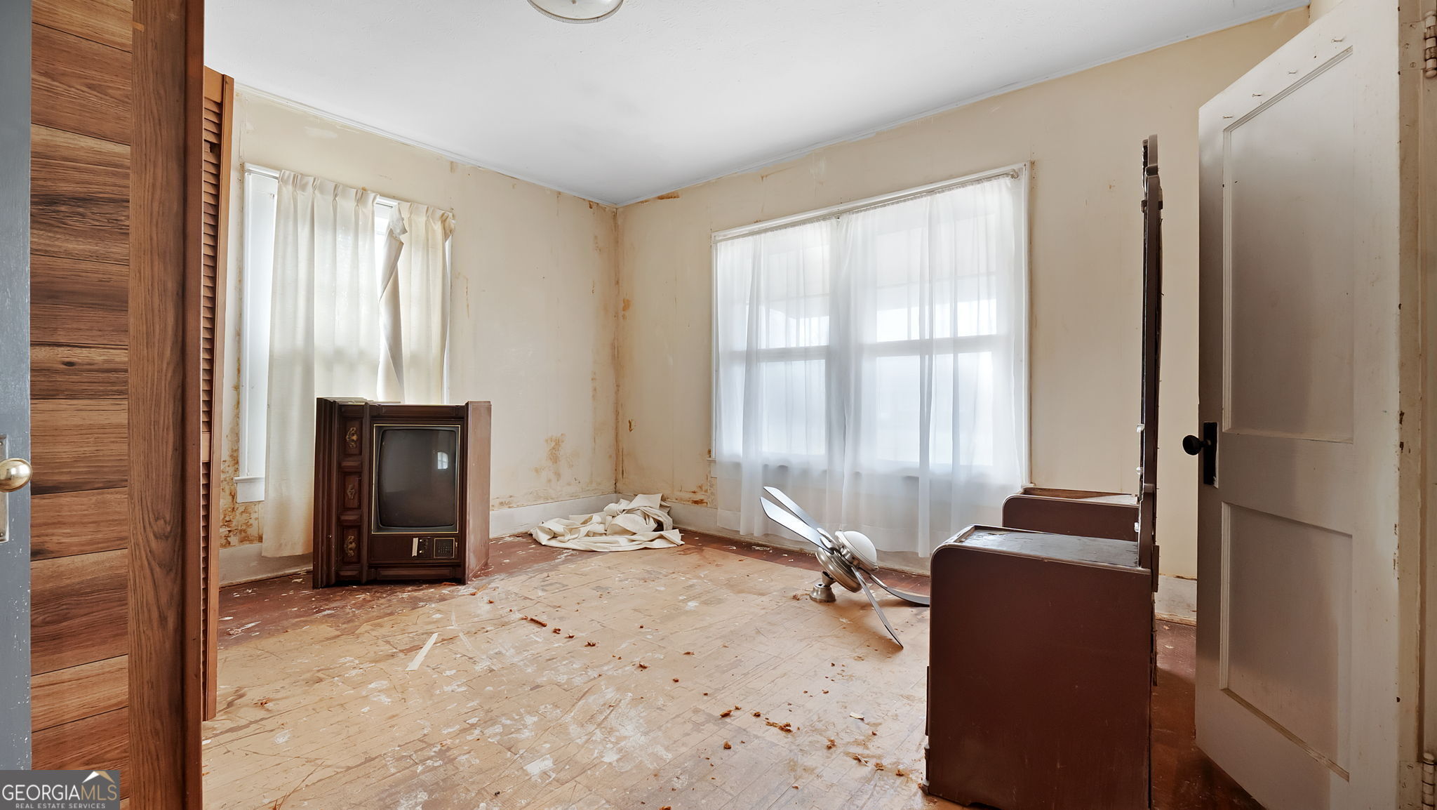110 Bevis Circle Bowdon, GA 30108 - Photo 17 of 26 a view of an empty room with a window