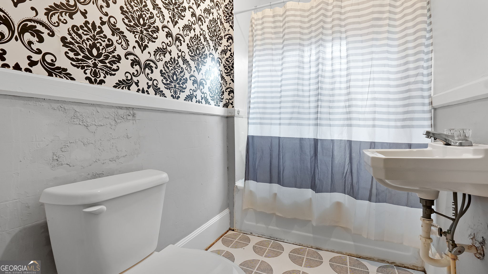 110 Bevis Circle Bowdon, GA 30108 - Photo 18 of 26 a bathroom with a toilet and a sink