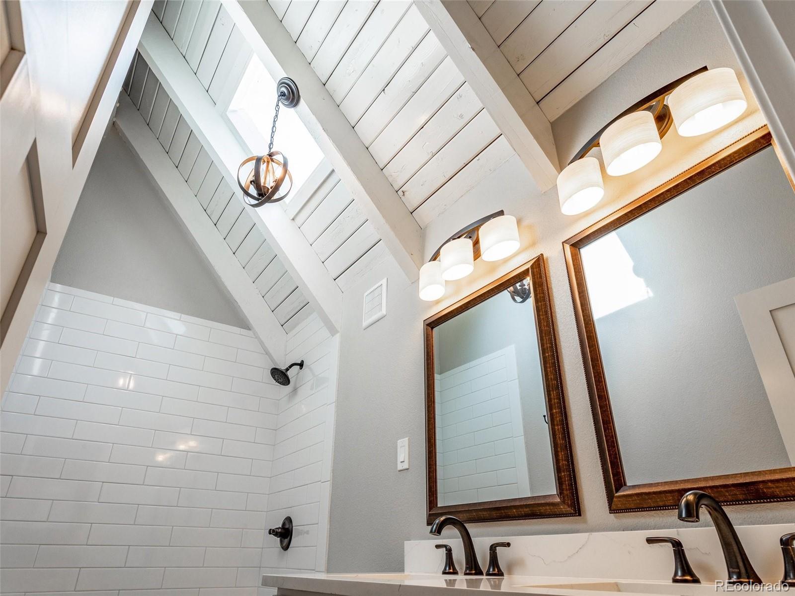 442 Deer Trail Road Boulder, CO 80302 - Photo 18 of 40 a bathroom with a sink and a mirror