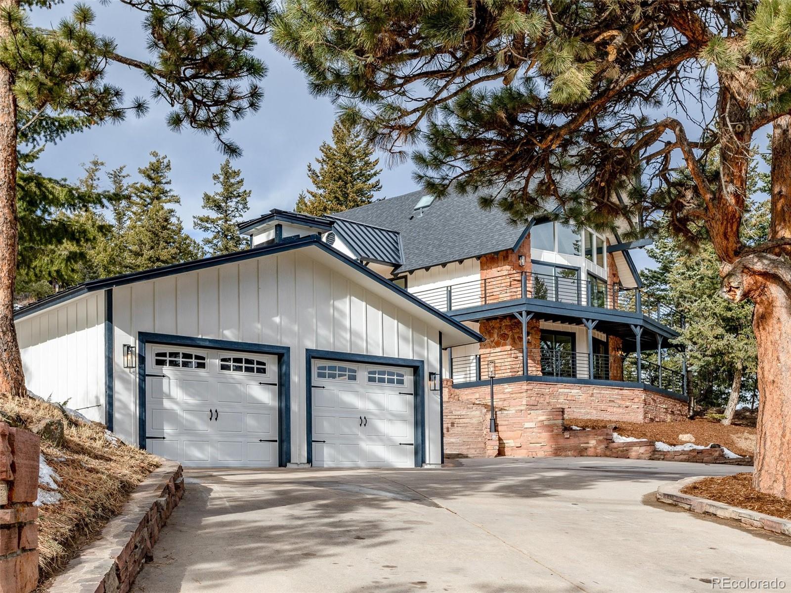 442 Deer Trail Road Boulder, CO 80302 - Photo 2 of 40 a house with a tree in the background