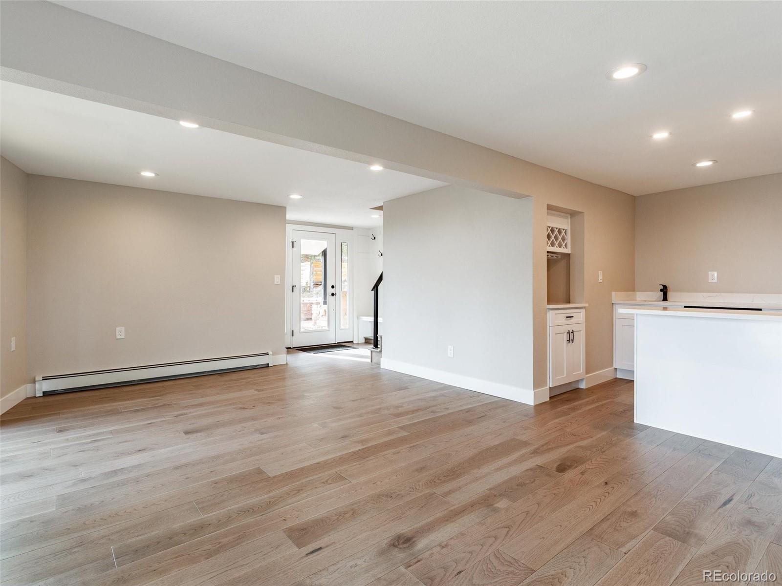 442 Deer Trail Road Boulder, CO 80302 - Photo 25 of 40 a view of empty room with wooden floor
