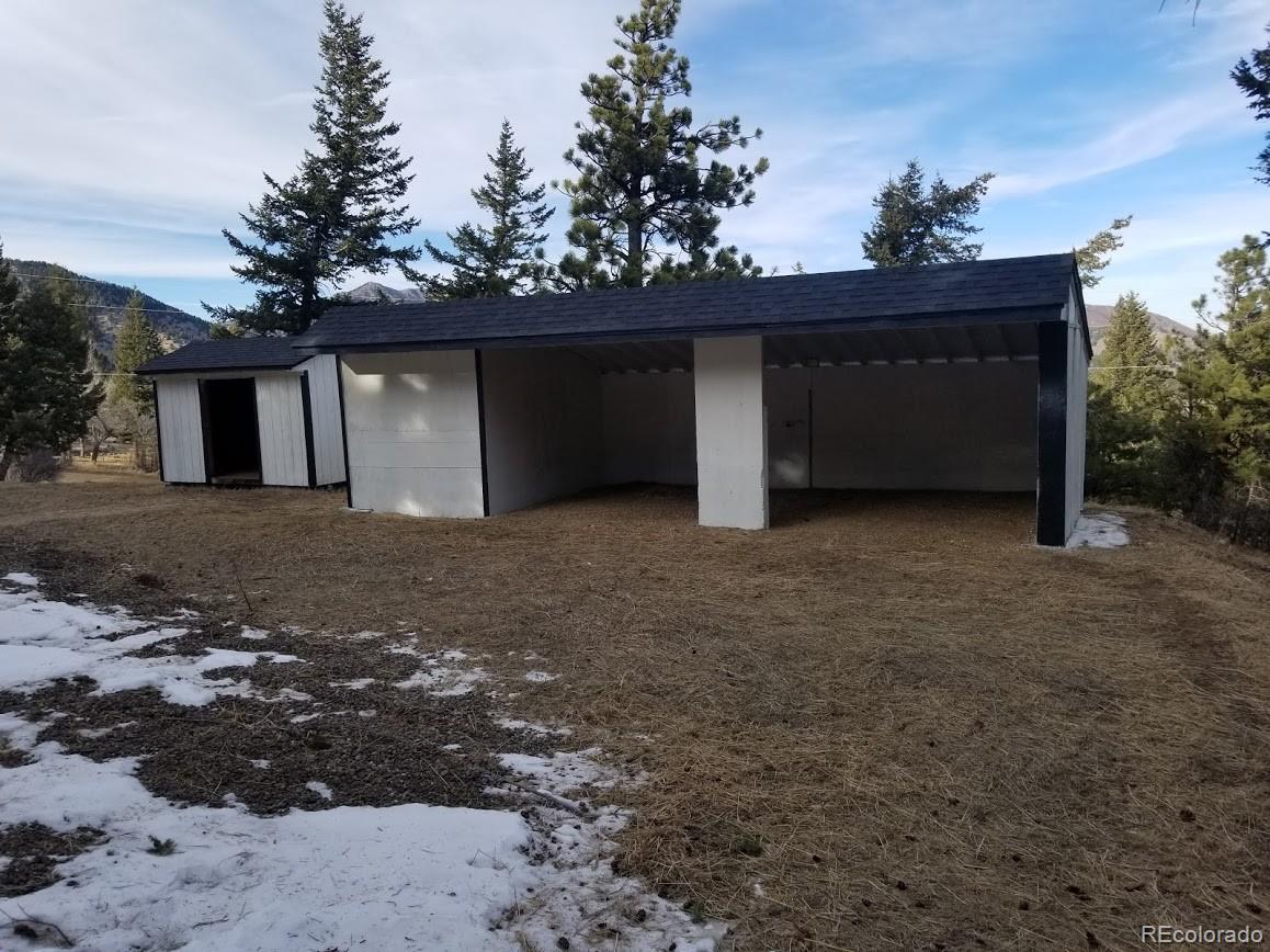 442 Deer Trail Road Boulder, CO 80302 - Photo 28 of 40 a view of a house with a yard